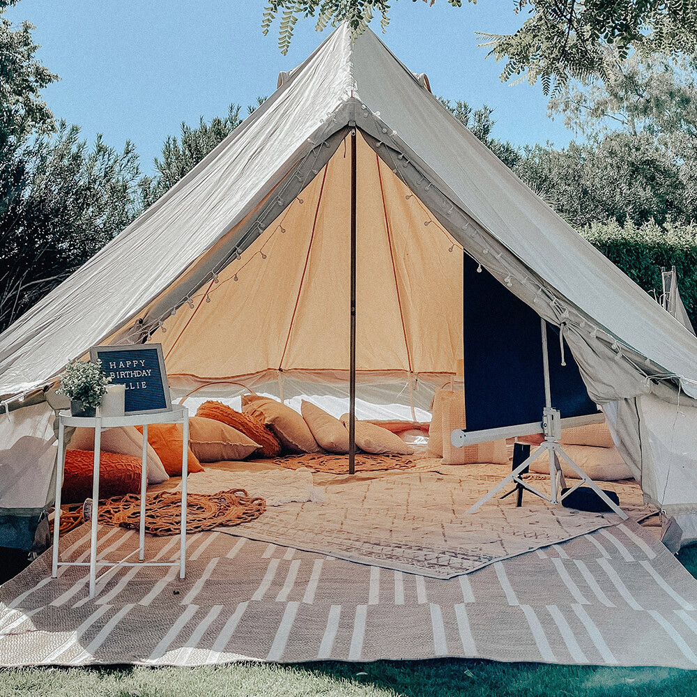 Glamping Tent setup with movie night.